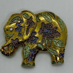 Gold Elephant Brooch with Floral Design